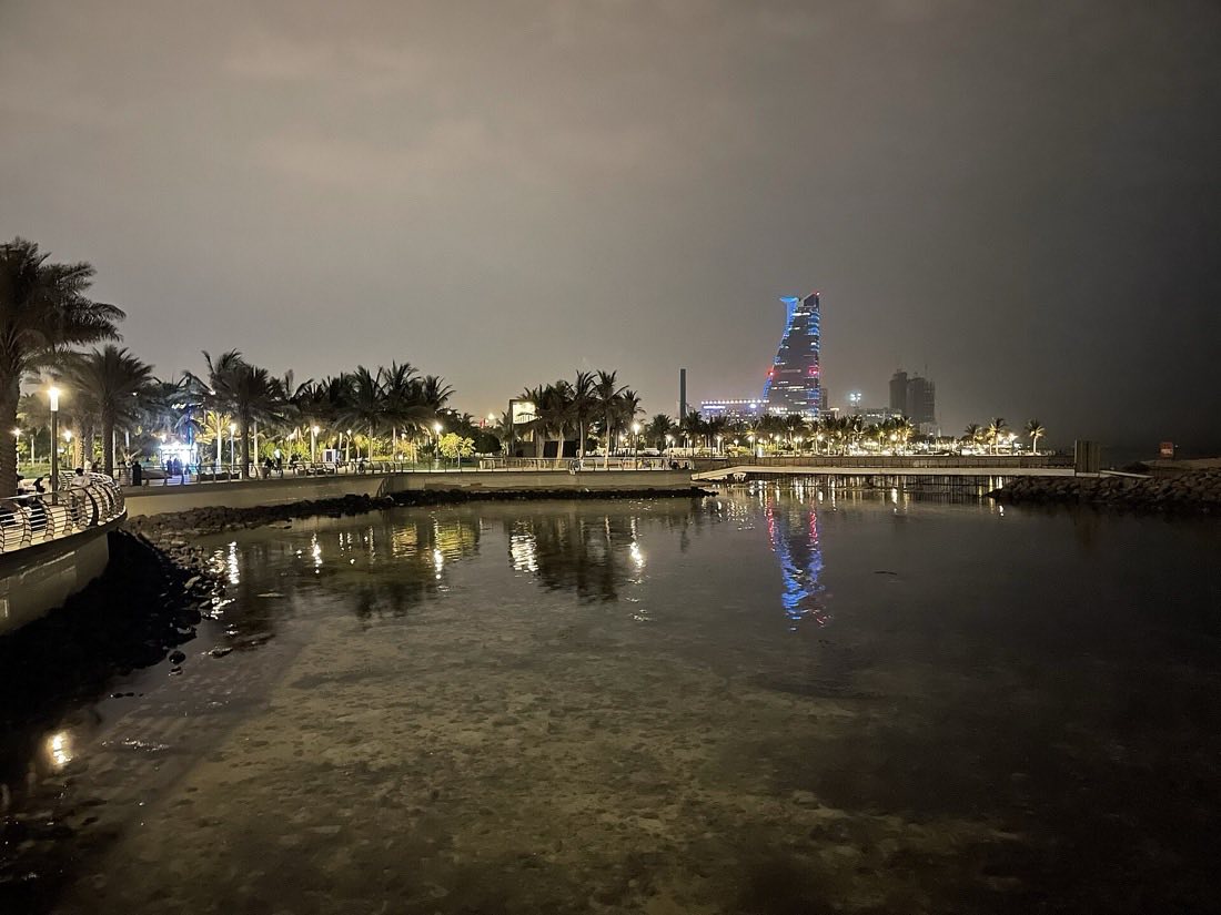 The Jeddah Corniche at night, looking along the waterfront.